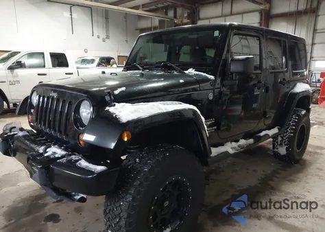 2012 Jeep Wrangler Unlimited Sahara из США, поврежденный, VIN 1C4HJWEG9CL100111